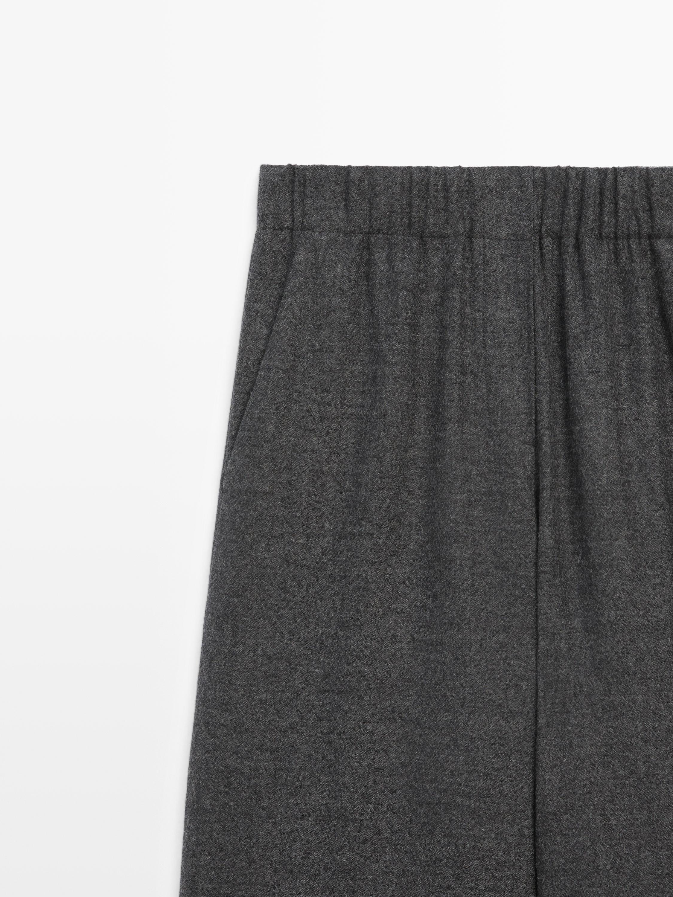 100% wool wide-leg textured trousers